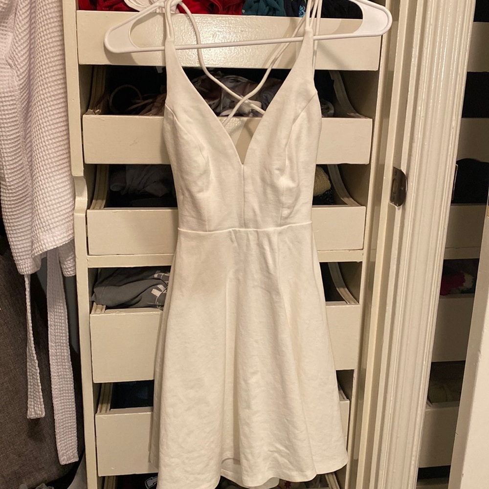 White skater dress with V neck and strappy back Lulus